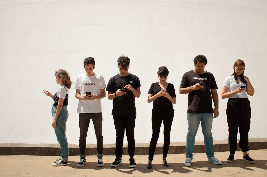 people scrolling on smartphones